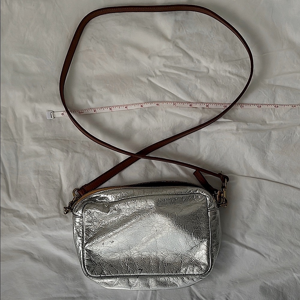 Clare V silver “mini sac” metallic purse with brown leather strap
